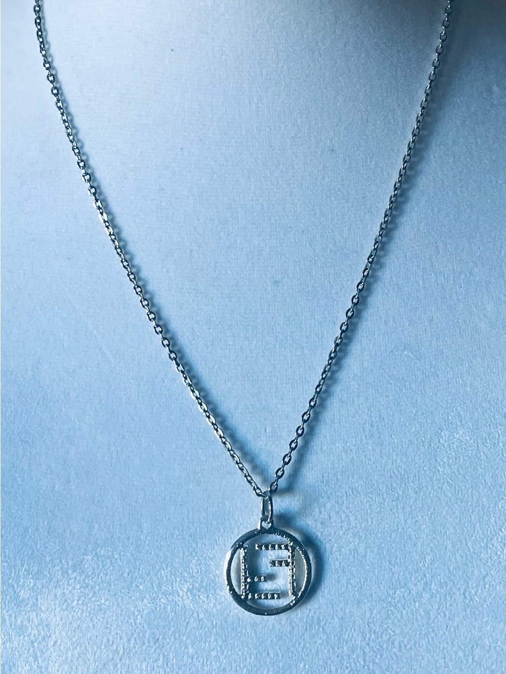 Silver Luxury “FF” Medallion on Silver Chain